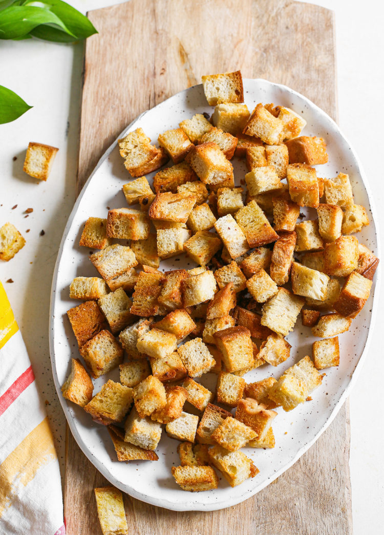 sourdough croutons on a white platter