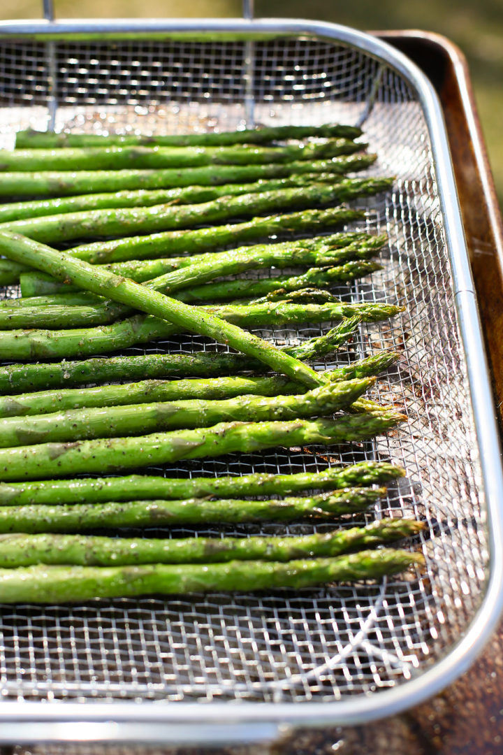 cooked traeger asparagus in a grill pan