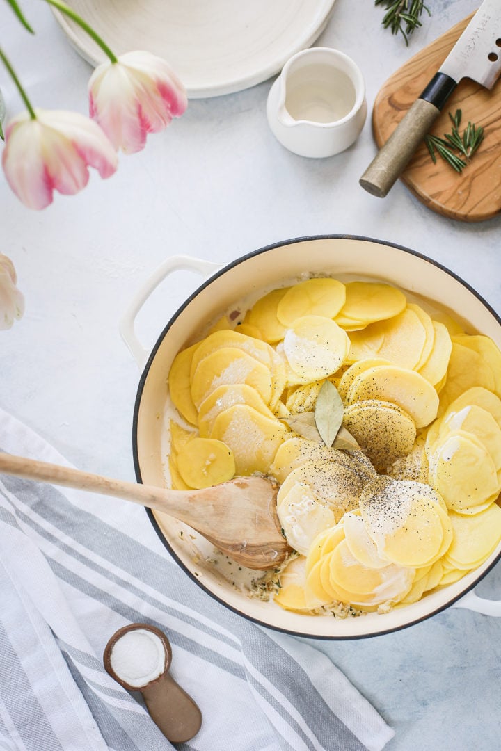 a pot of scalloped potatoes cooking