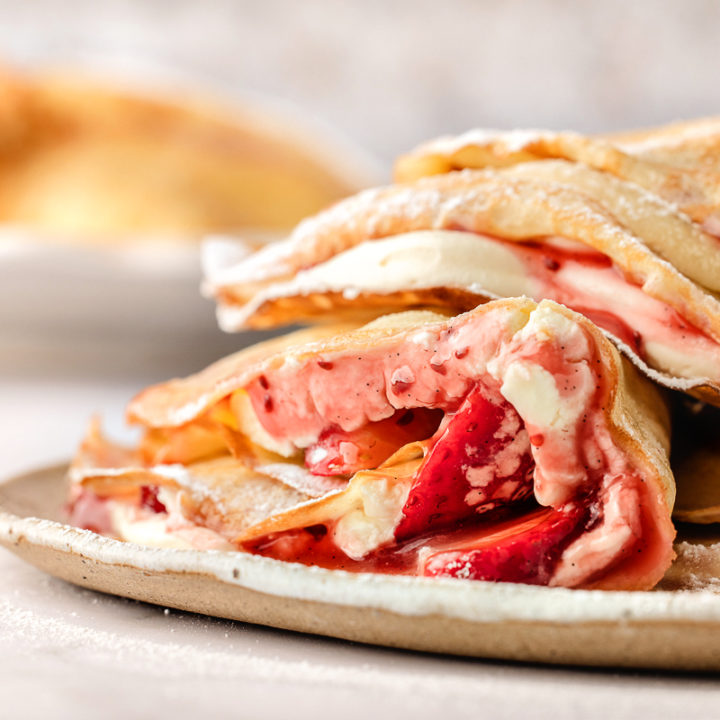 strawberry crepes on a plate