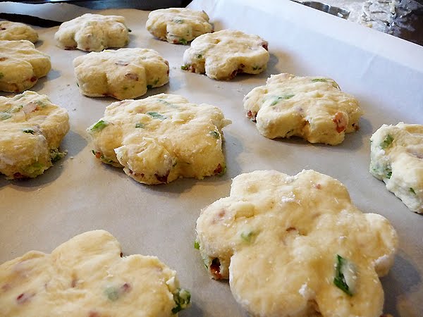 scones with bacon and cheese on a baking pan ready to bake