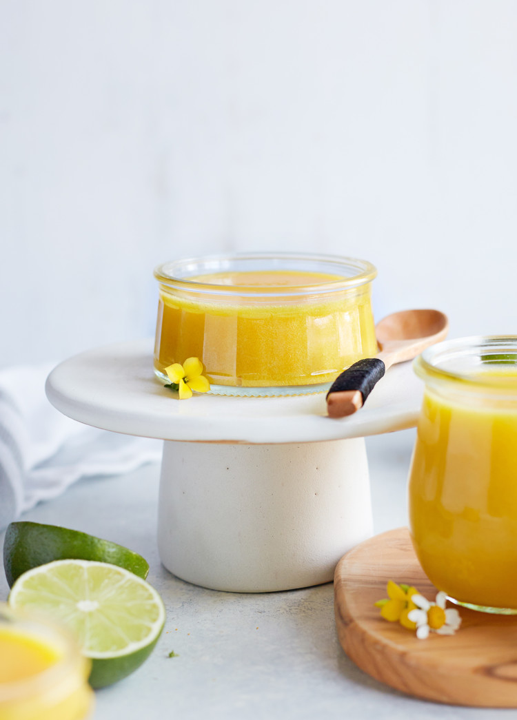 jar of lime curd on a white serving platter