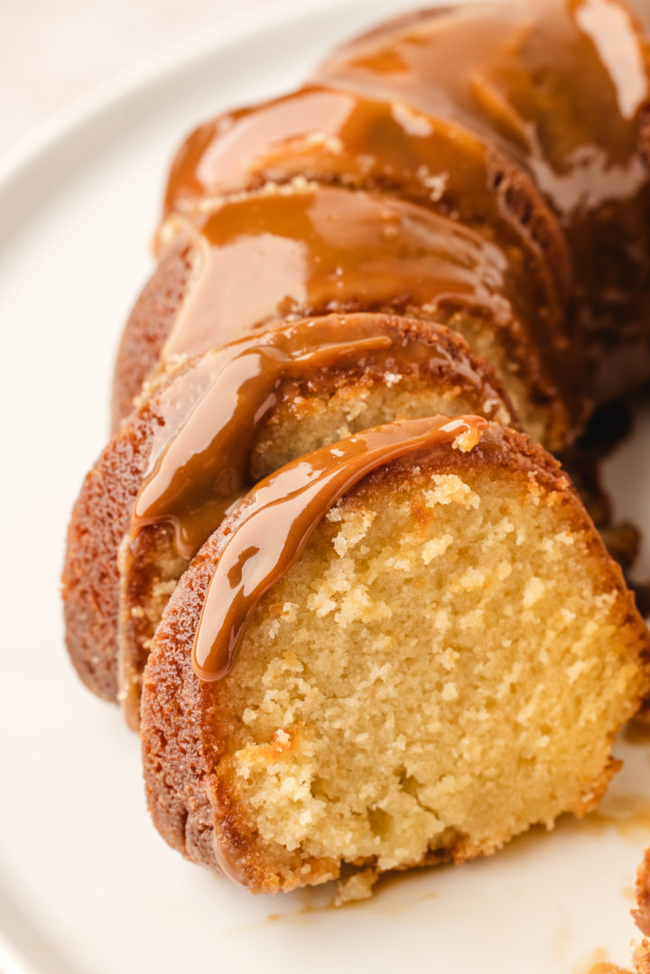 kentucky butter cake wit salted caramel glaze sliced on a serving platter