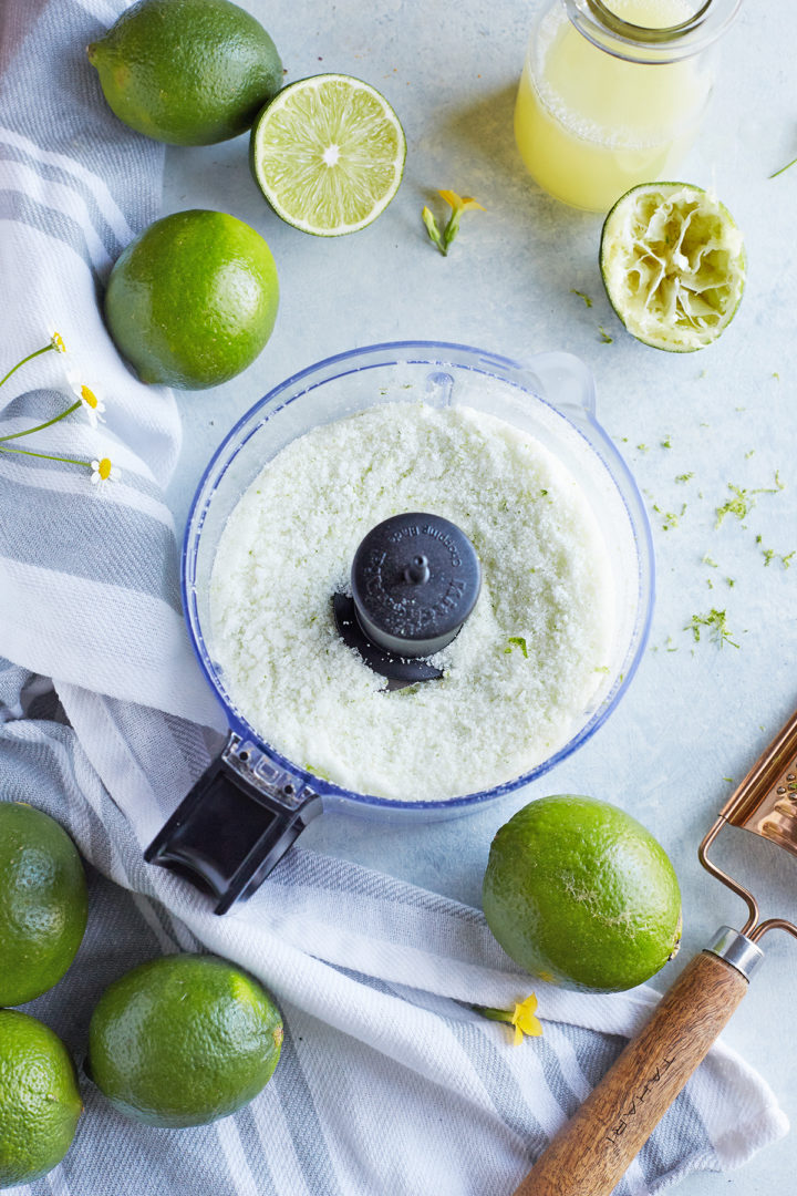 showing how to combine sugar and lime zest in this recipe for lime curd