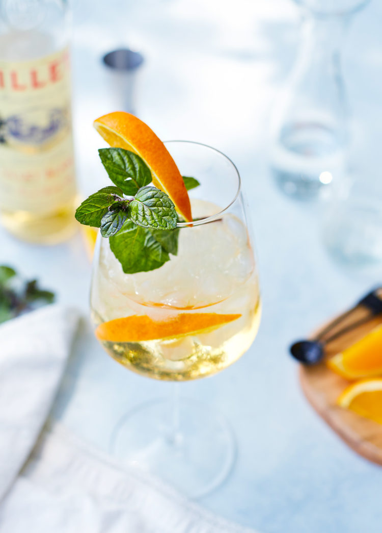 lillet blanc cocktail on a blue background