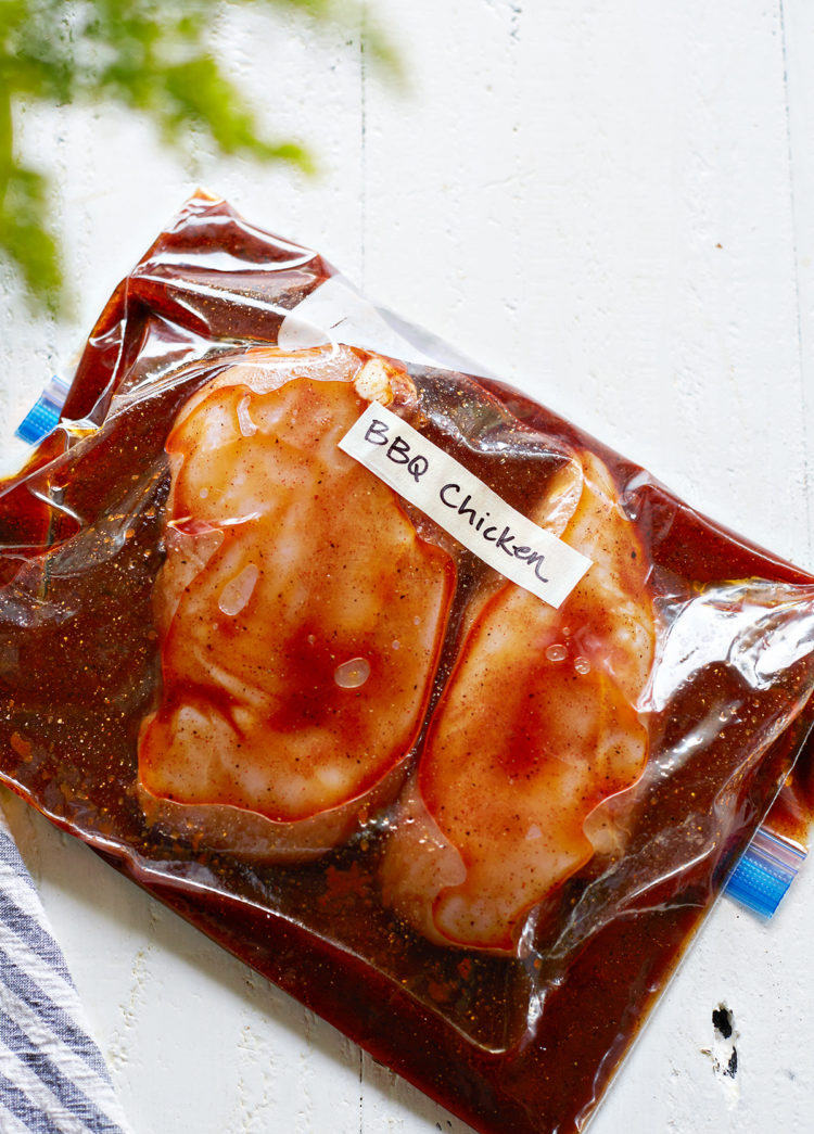 chicken breasts in a zip top bag with bbq chicken marinade