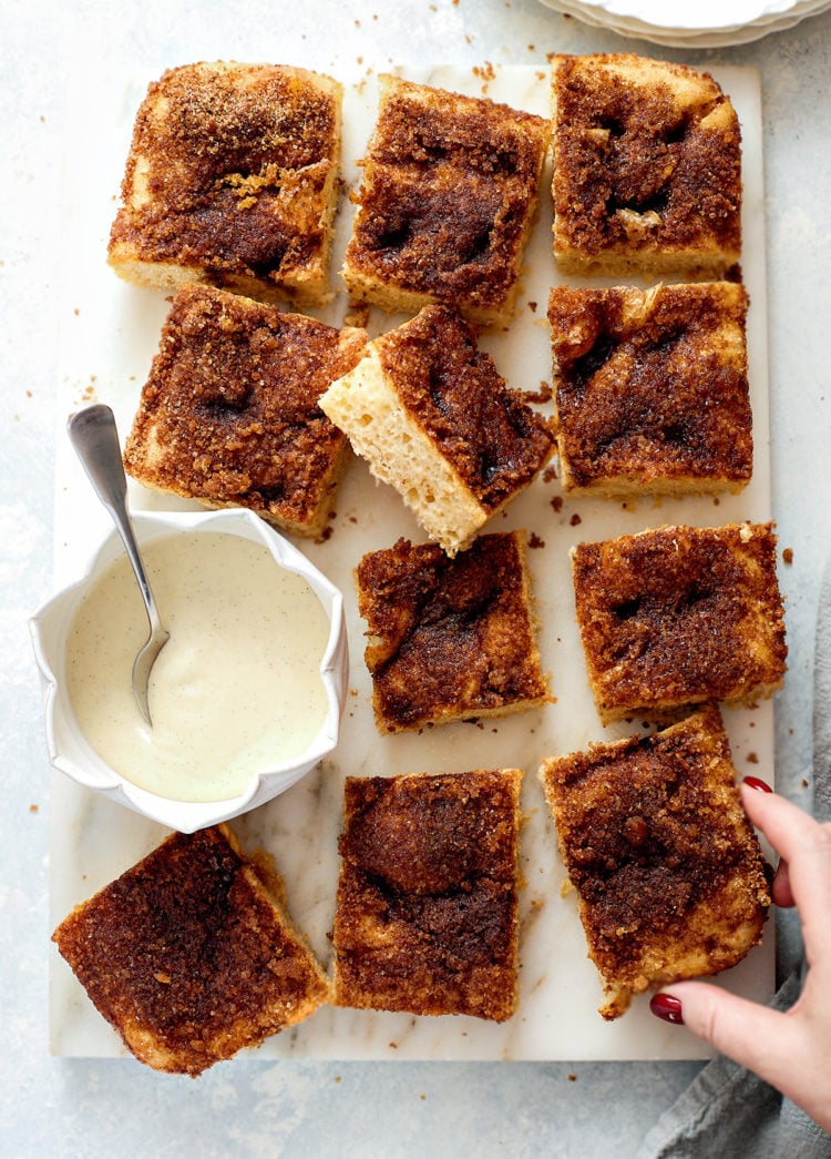 This cinnamon sugar focaccia is soft, bubbly, and layered with buttery cinnamon sugar and finished with a bourbon cream cheese glaze for the perfect sweet breakfast focaccia. It has all the flavors of cinnamon rolls in an easy, shareable focaccia-style bake. Ideal for holiday mornings, brunch, or make-ahead breakfasts. Includes step-by-step dough instructions and glaze options.