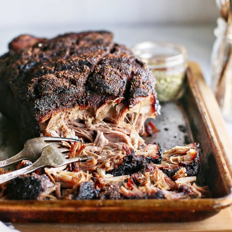 shredded smoked pork shoulder on a tray